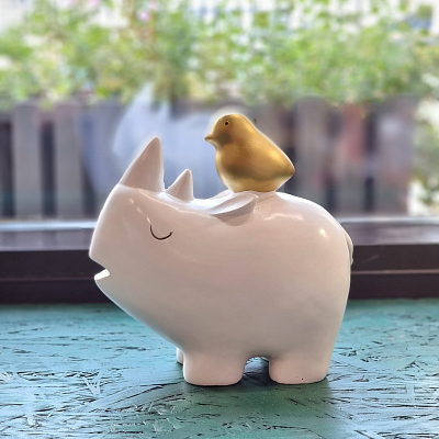 Статуэтка носорог и пеночка